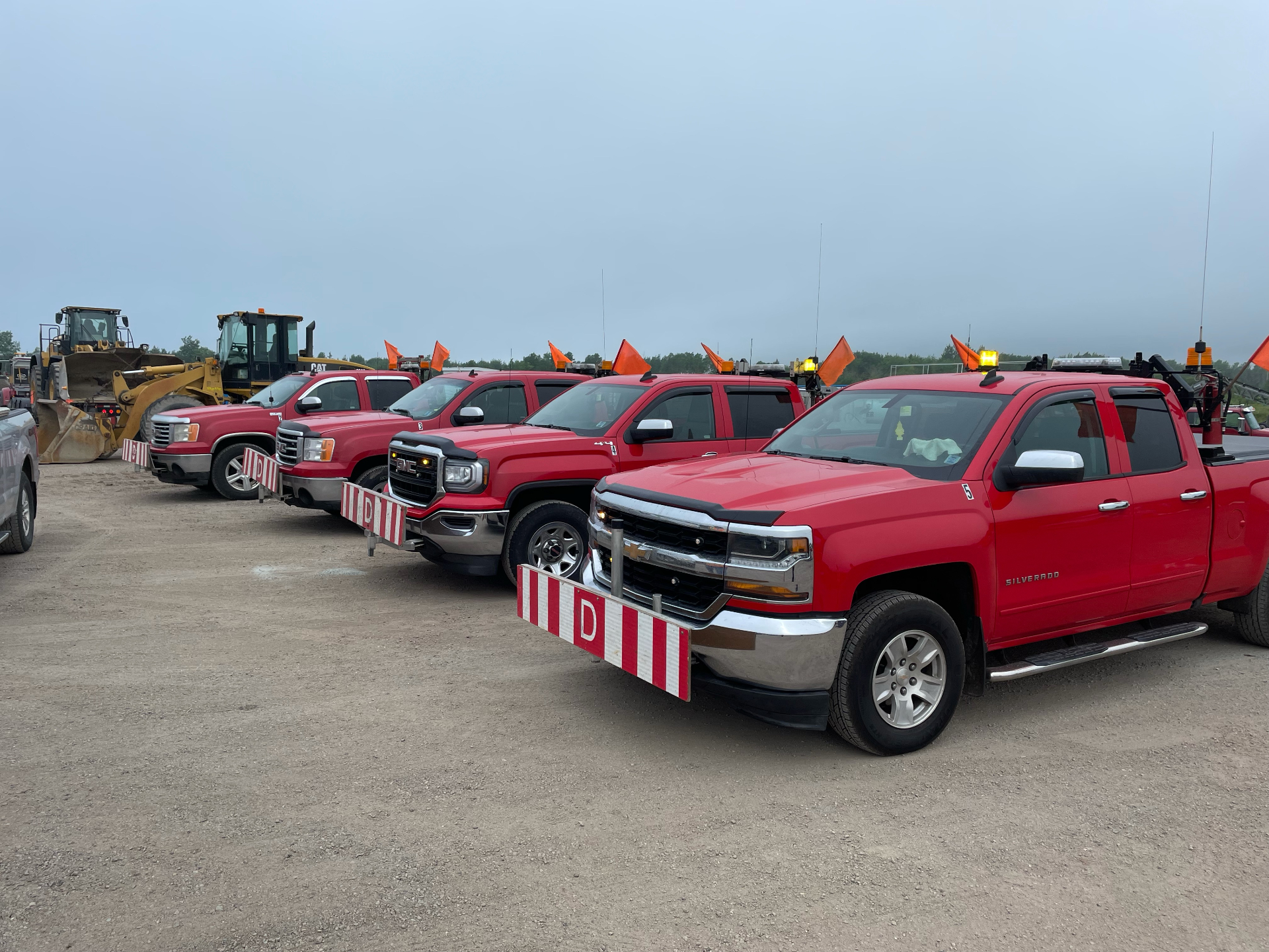 Melmerby Safety pilot car fleet lined up with oversize load flags
